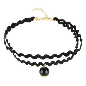 Black gothic leather and gold choker in women